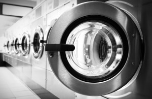 Open door in a washing machine row,